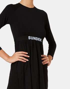 VESTIDO CORTO DE MANGA LARGA Y FALDA EVASÉ
