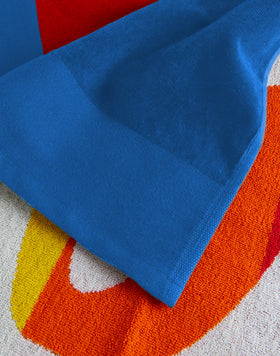 SUIVEZ LE SOLEIL SERVIETTE DE PLAGE JACQUARD