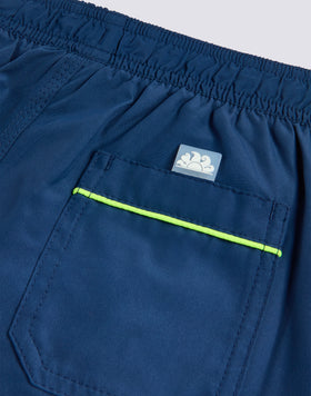 MAILLOT DE BAIN LONG POUR ENFANT EN POLYESTER RECYCLÉ REPREVE® AVEC INSCRIPTION SUR LE CÔTÉ