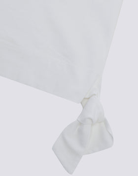 MINIVESTIDO DE NIÑA LISO CON LAZO