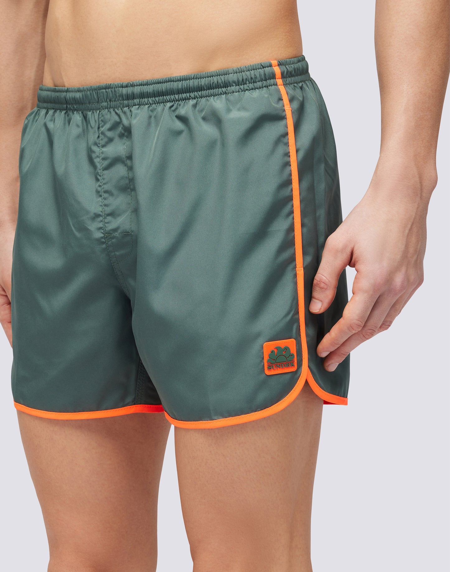 SHORT SWIMSHORTS WITH ELASTIC WAIST AND ROUND SIDE SLITS