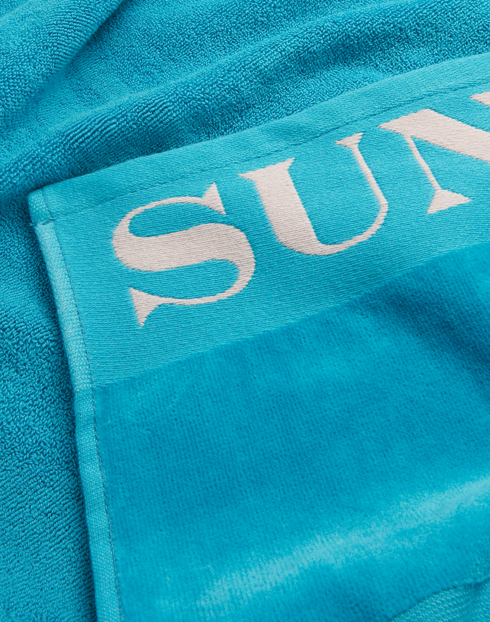 SERVIETTE DE PLAGE JACQUARD AVEC LOGO